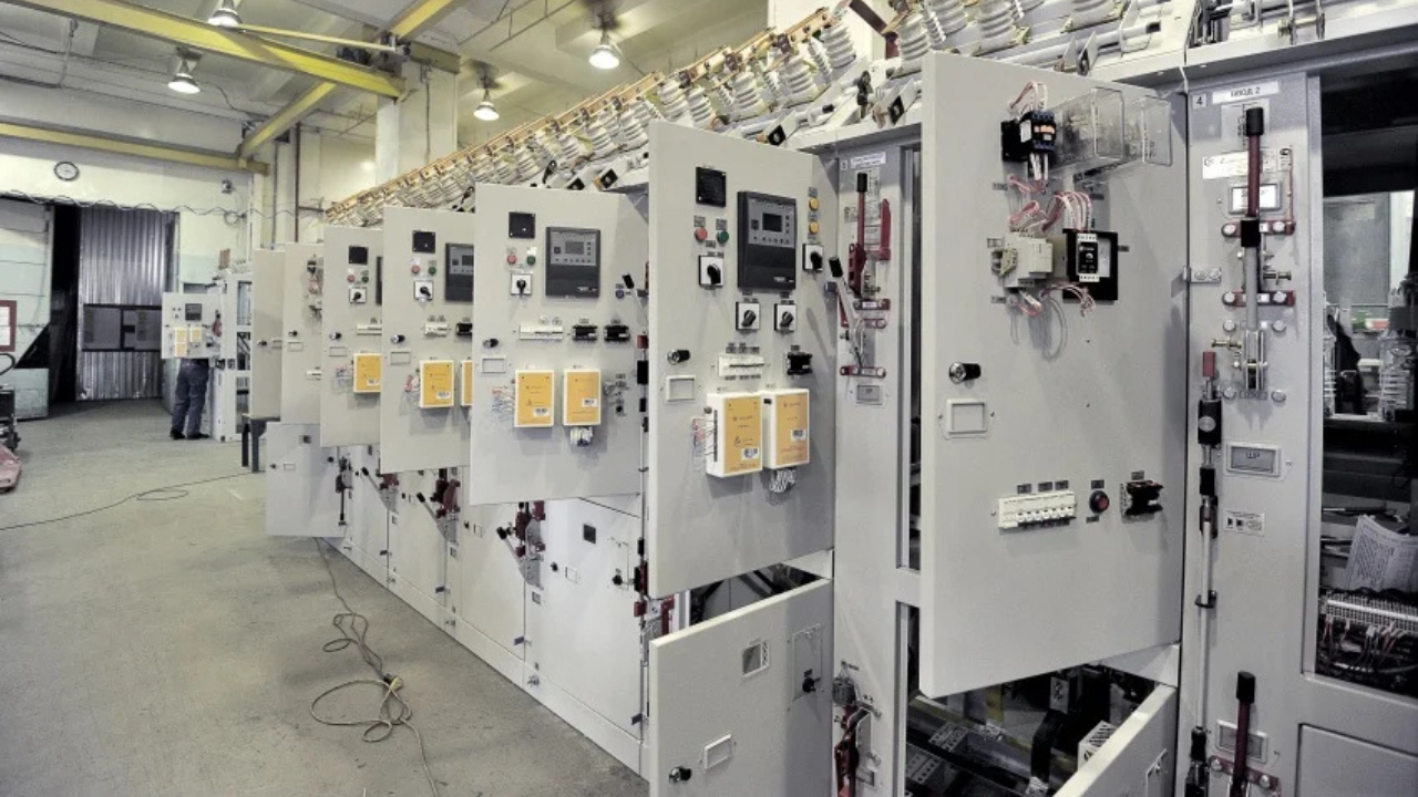 Clean and organized commercial electrical control panels inside an industrial facility, highlighting routine electrical maintenance to prevent system failures and downtime.