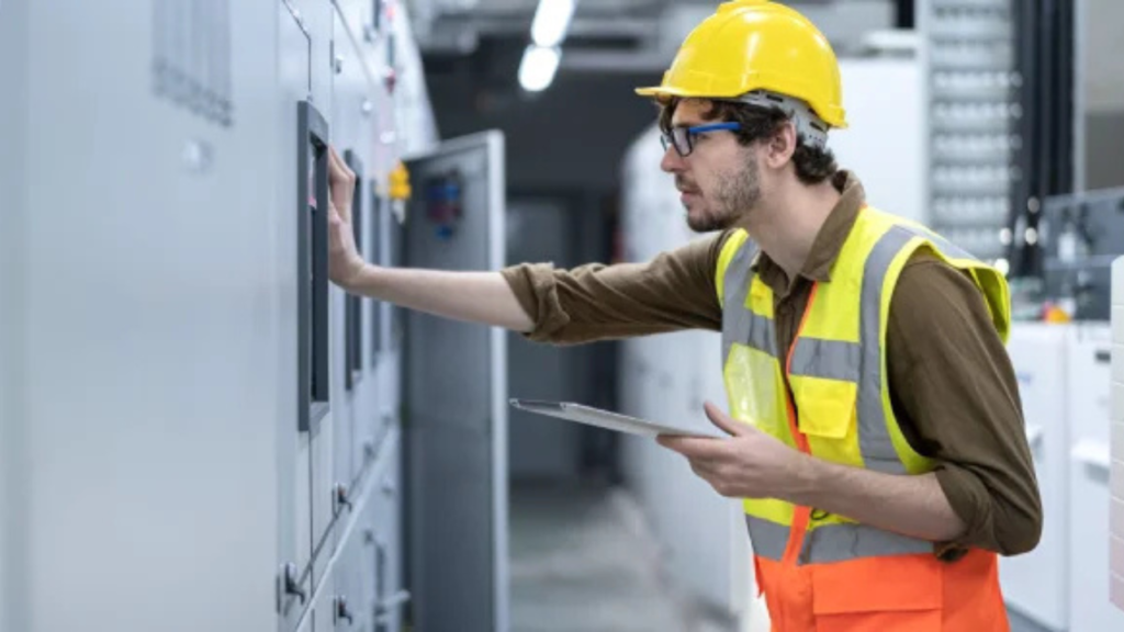 Commercial electrician conducting a detailed electrical inspection