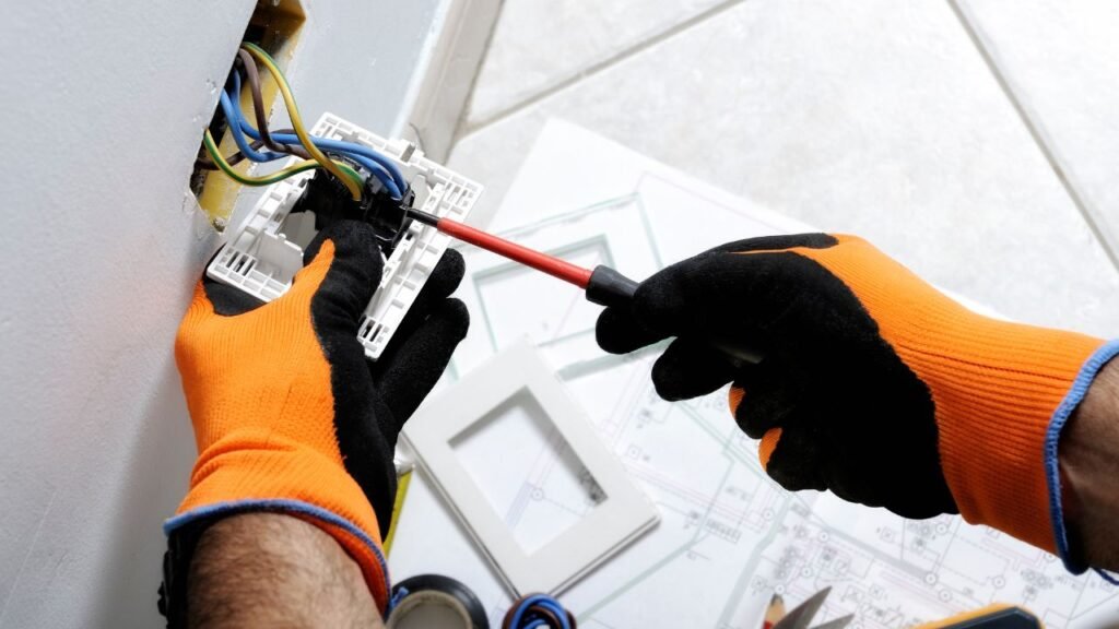 A busy industrial facility with various electrical systems in action, showcasing industrial electricians at work